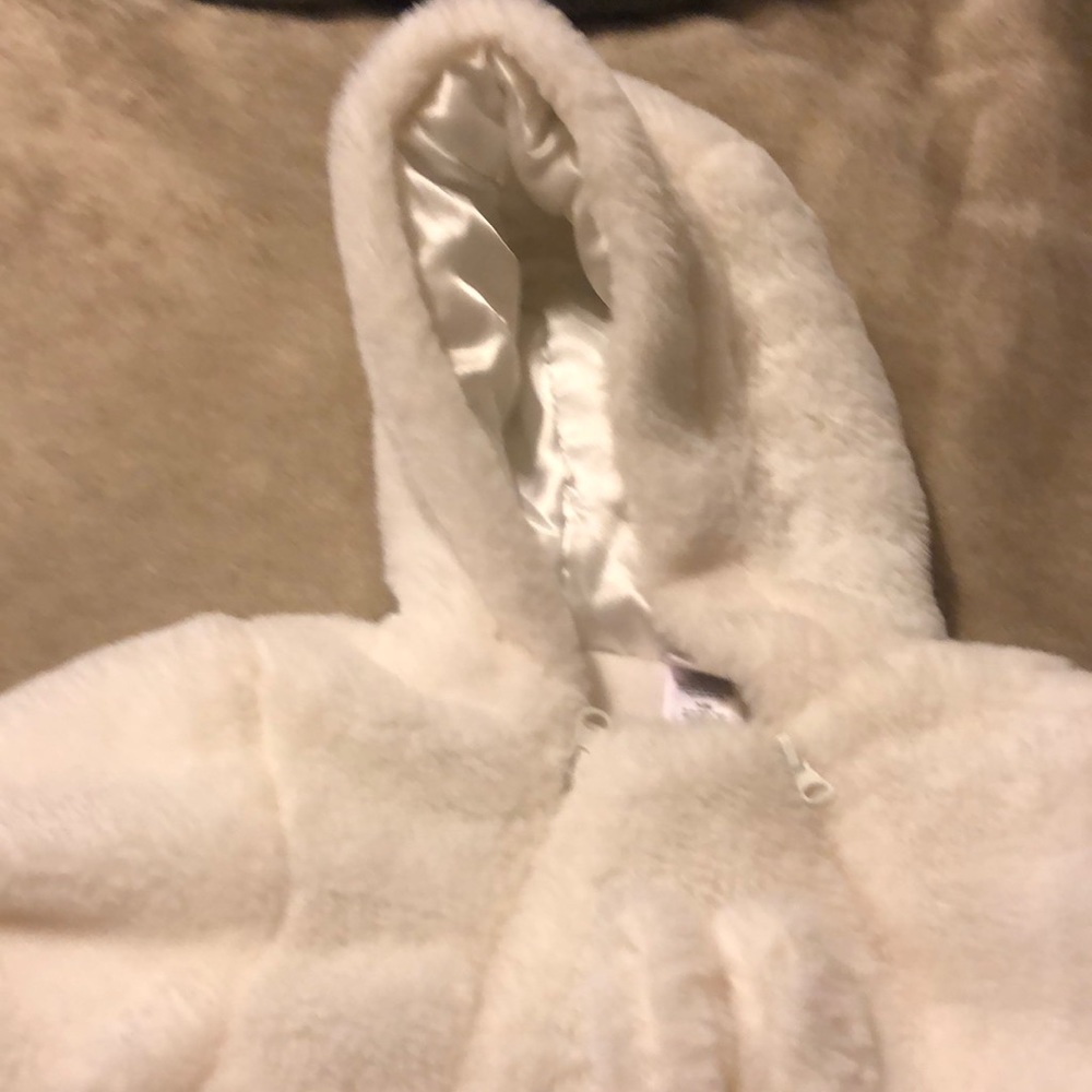 Infant white snowsuit size 3-6 months. Never used
